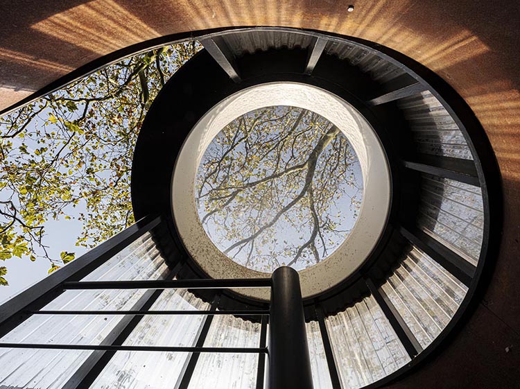 rounded-corten-steel-guest-cabin