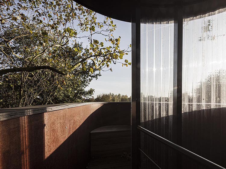 rounded-corten-steel-guest-cabin