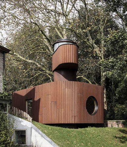 rounded-corten-steel-guesthouse