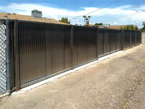 corten-steel-fence-panels-corrugated-type-installing