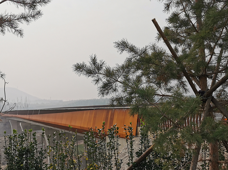 corten-steel-bridge-jiulongshan-mine-ecological-restoration-park.