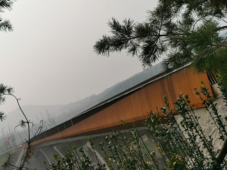corten-steel-bridge-jiulongshan-mine-ecological-restoration-park