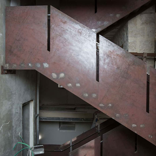 corten-steel-saircase-with-cladding-wall