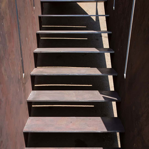 corten-steel-saircase-with-cladding-wall