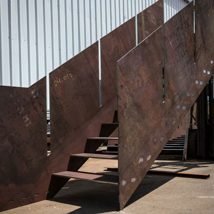 corten-steel-saircase-with-cladding-wall