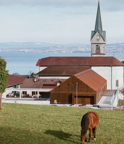 Corten-Steel-and-Concrete-School-Overlooks-Lake